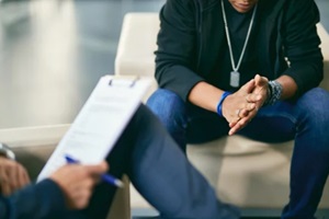 african american adolescent during individual therapy session