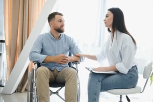 patient visiting psychotherapist to deal with consequences