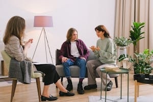 Couple Talking to A Therapist during couples therapy in maryland