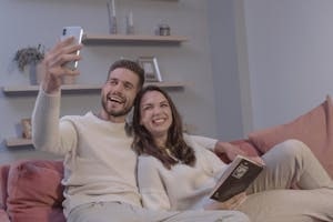 Happy Couple Taking Selfie While Spending Time with Each Other