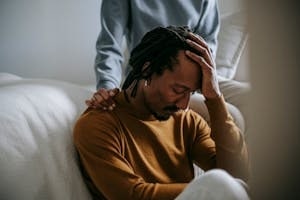 Wife Supporting Her Sad Husband