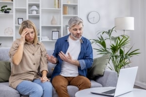 Couple Engaged in A Serious Virtual Telehealth Therapy Session