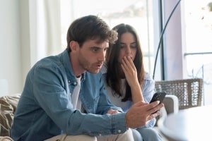 Man Shocking while Seeing Social Media Chats on Phone of His Girl