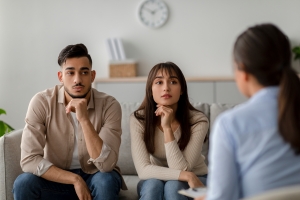 Couple Listening to A Therapist in Therapy Session