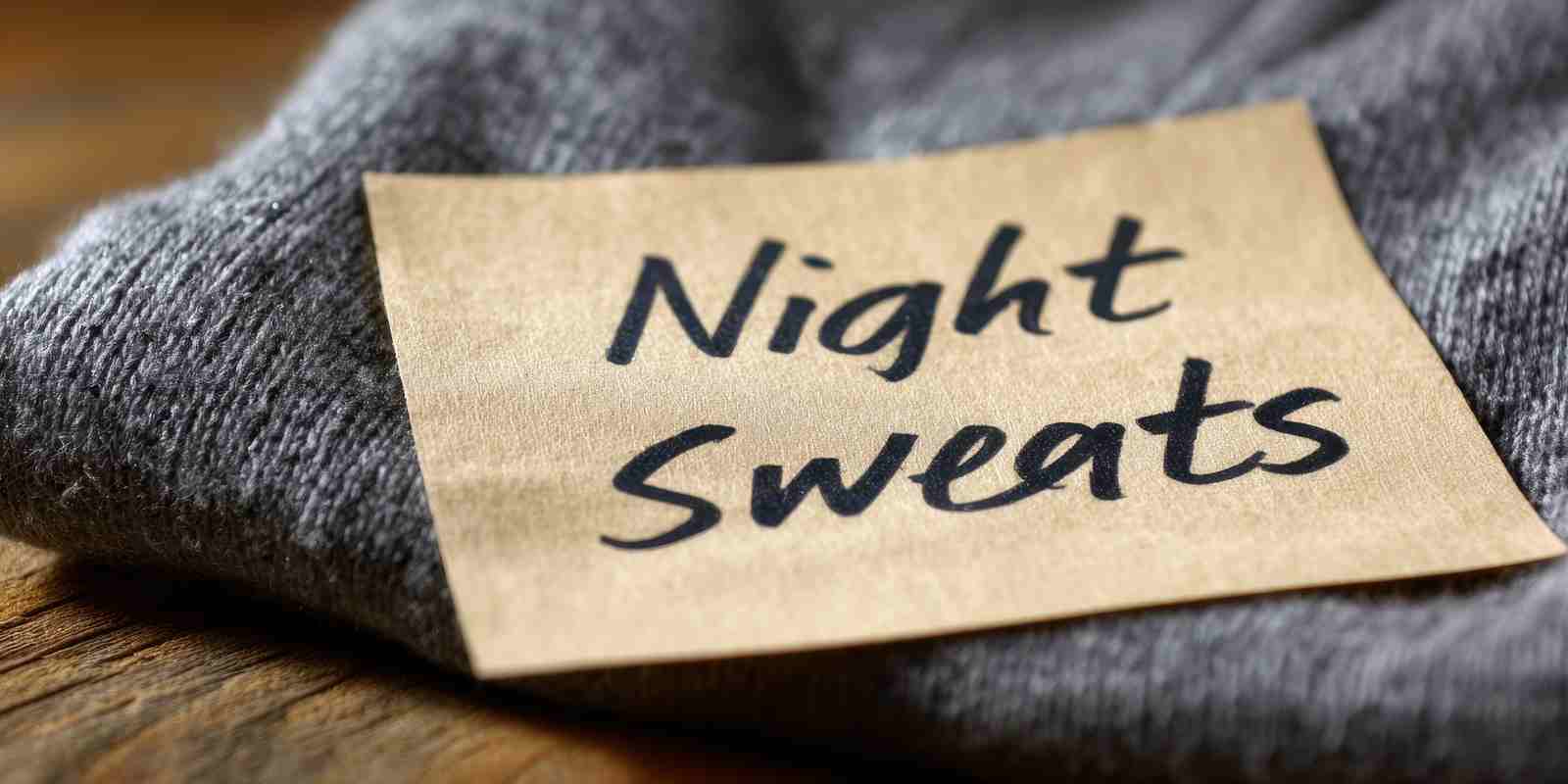Night Sweats Written on Paper Over A Cloth