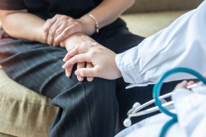 Therapist Encouraging Middle Age Old Menopause Woman