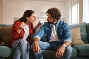 Man Listening to His Angry Wife Peacefully to Avoid Argument