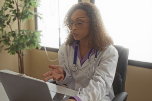 Therapist Providing Online Consultation to Her Patient