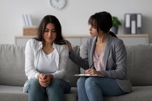 Young Woman Suffering from Stigma Having Mental Health Therapy