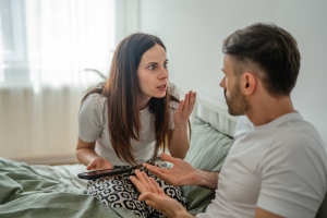 Couple Arguing in Bedroom about Relationship Conflict