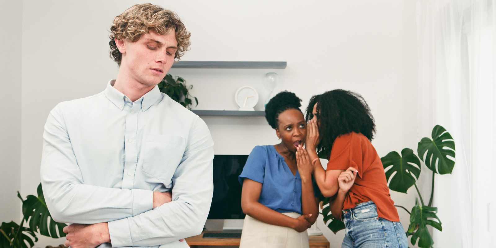 Man Standing Apart While Siblings Whispering about Him in Blended Family