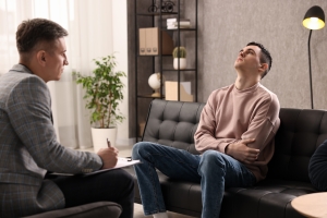 Psychotherapist Writing Problems of Client During Indivisual Therapy Session