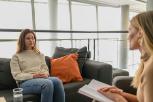 Crying Woman Having Indivisual Therapy for Grief