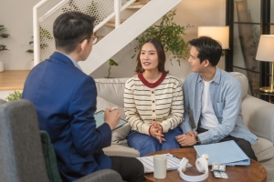 Couple Consulting with A Marriage Counselor in His Office