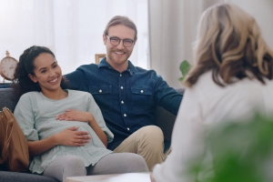 Pregnent Woman and Her Husband in Counseling with A Psychologist