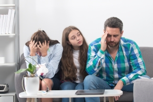 Couple and Child Stressed About Divided Front During Parenting