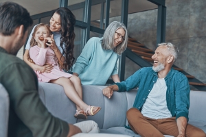 Couple Living with Parents Spending Time Together Showing Happy Familism