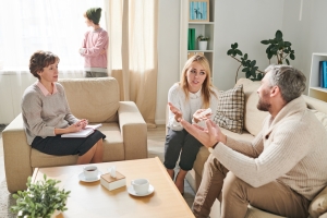 Parents Discussing Their Problems in Front of Psychologist